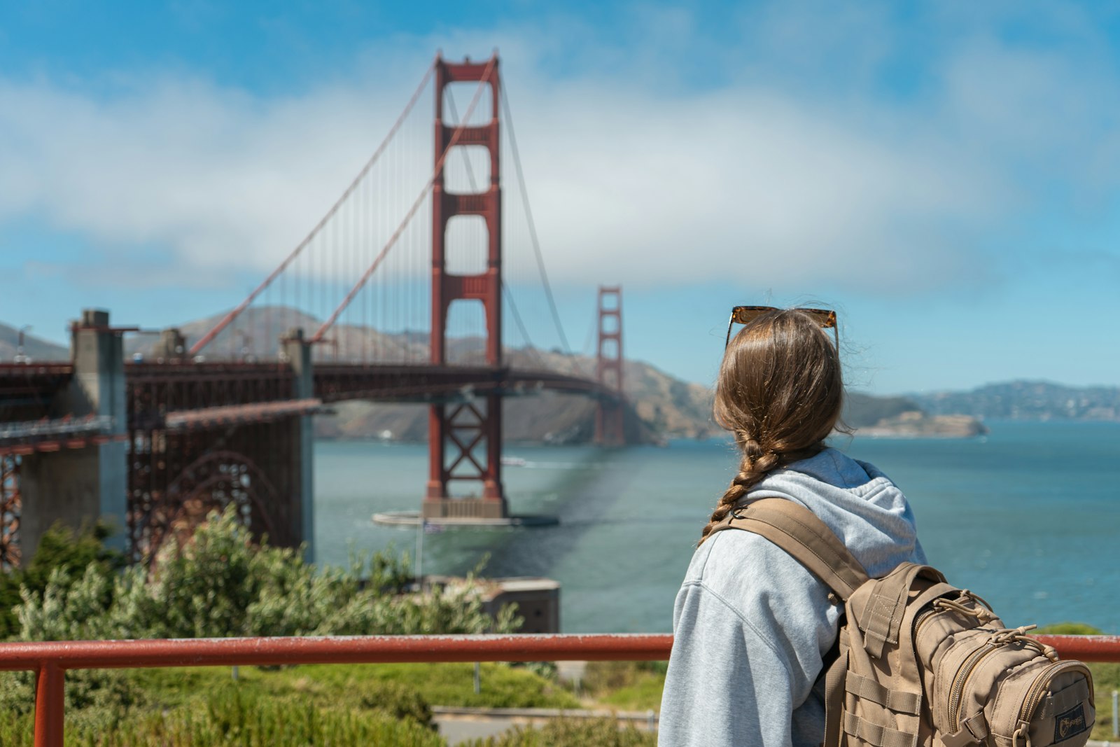 The full 4:3 frame the camera sensor captures: a traveler looking at the Golden Gate Bridge
